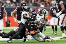 D'Andre Swift is tackled by Andre Cisco and Ventrell Miller 15/10/2024