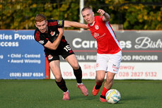 Conor McKendry in action with Jarlath O’Rourke 19/10/2024