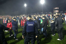 An Garda Síochána on the pitch after the game 25/10/2024