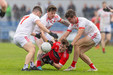 Hugh Bourke in action against Jarlath Collins, Aaron Fitzgerald and Manus Doherty 10/11/2024