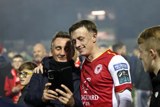 Chris Forrester celebrates with a fan after the game 
25/10/2024