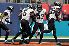 Andre Cisco celebrates an interception with teammates 15/10/2024