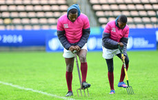 Ground staff work to prepare the pitch 9/7/2024