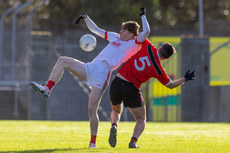 Einne O'Connor of Eire Og in action against Ronan Connolly 10/11/2024