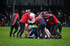 Coolera Stranhill players celebrate with Ross Doherty after he scored the winning penalty 17/11/2024