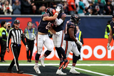 Cole Kmet celebrates scoring his second touchdown with Gerald Everett 15/10/2024