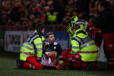 Ellis Chapman receives treatment before being carried from the pitch 14/10/2024