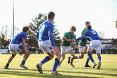 Henry McErlean is tackled by Giovanni Sante 17/12/2022