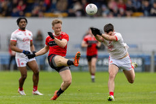 Shane Doherty of Adare in action against Darren O'Brien 10/11/2024