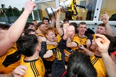 St. Eunan’s players celebrate with the Dr. Maguire Cup 13/10/2024