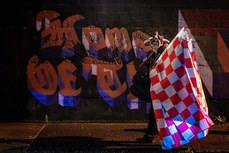 A flag seller outside Weavers Park before the game 18/10/2024