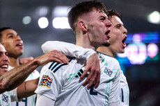 Conor Bradley celebrates with teammates after scoring a goal 18/11/2024