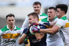 John McGrath is tackled by Tadhg Condon, Joe Higgins and Ross Peters 20/10/2024 