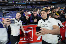 Cameron Roigard and Anton Lienert-Brown takes selfies with fans after the game 16/11/2024