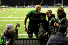 Hugh Gavin poses for photos with young fans after the game 19/10/2024 