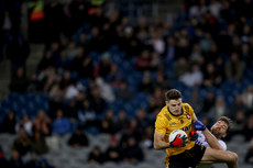 Niall Grimley competes at the throw-in with Aidan O’Shea 19/10/2024