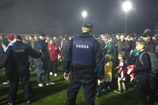 An Garda Síochána on the pitch after the game 25/10/2024