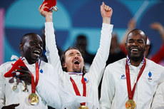 Khalifa Youme, Frederic Villeroux and Ahmed Tidiane Diakite celebrate winning gold 7/9/2024