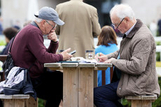 Racegoers study the form before this evening’s races 19/5/2023 