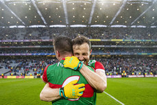Stephen Coen celebrates after the game with Darren Coen 14/8/2021