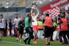 Conor McKenna celebrates with the trophy 11/9/2021