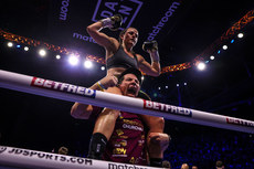 Chantelle Cameron celebrates after beating Katie Taylor by majority decision with Nigel Travis 20/5/2023 