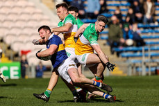 Jimmy Feehan is tackled by Lee Pearson and Conor McNamee 18/3/2023