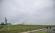 A view of a fire beside the pitch ahead of the game 11/3/2023  