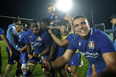 Italy players celebrate after winning the match 10/3/2023