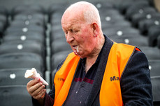A steward enjoying an ice cream during the game 20/5/2023