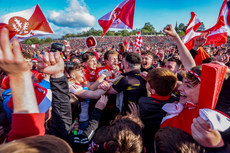 Brendan Rogers and Odhran Lynch celebrate after the game with supporters 14/5/2023 