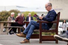 A racegoer studies the form before this evening’s races 19/5/2023 