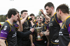 Instonians celebrate with the Division 2C cup 1/4/2023