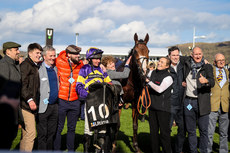 Derek Fox, Lucinda Russell and winning connections celebrate with Corach Rambler after winning 13/3/2023
