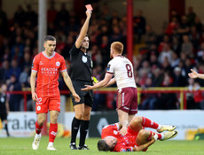 Rob Hennessy shows Aodh Dervin a red card  28/6/2024