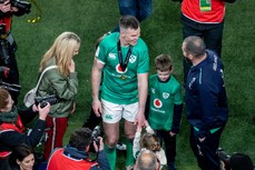  Johnny Sexton talks with head coach Andy Farrell and his wife after the game 18/3/2023