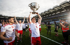 Conor Meyler celebrates with the trophy 11/9/2021