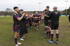 Skerries walk through the Instonians guard of honour after the game 1/4/2023