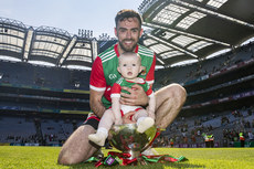 Kevin McLoughlin celebrates after the game with daughter Saorla 25/7/2021