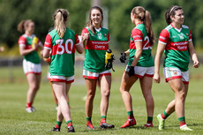 Niamh Kelly celebrates after the game with teammates 6/6/2021