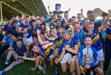Tipperary players and supporters celebrate with the John Doyle Perpetual Cup 20/5/2024