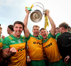Daire O Baoill, Stephen McMenamin and Mark Curran celebrate with the Anglo Celt Cup12/5/2024