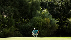 Rory McIlroy lines up a putt on the 8th 9/9/2023