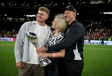 John Plumtree celebrates with the cup after winning with his wife Lara and son Taine 24/5/2024