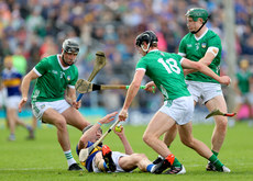 Diarmaid Byrnes, Conor Boylana and William O'Donoghue tackle Gearoid O'Connor 21/5/2023 