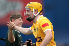 Cormac McKeown celebrates with a supporter after the game 27/4/2024