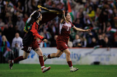 Hala Sarawi and Sara Kord celebrate with the Palestine flag after the game 15/5/2024