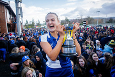 Gaby Lewis celebrates with the trophy 8/2/2019