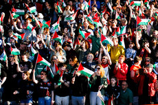 Supporters wave Palestinian flags ahead of the game 15/5/2024