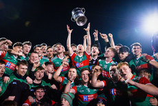 Stephen Mullins lifts the Paddy Moclair Cup as his team celebrates winning  26/10/2024